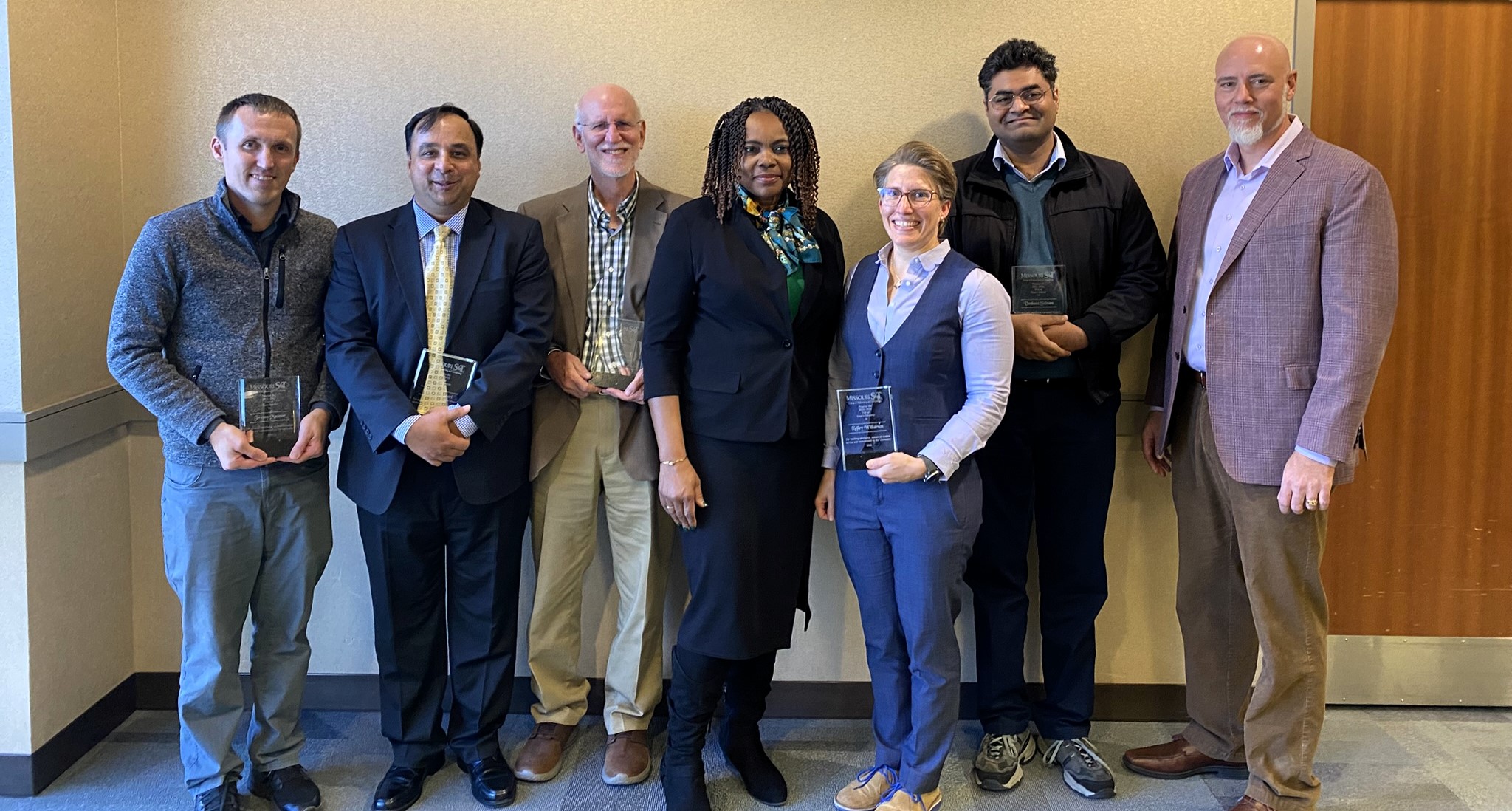 Dr. Sid receiving the CEC Dean's Scholar award in November 2024